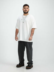 White cotton Omer Wenkert Now Is Good T-shirt with a small black Hebrew message printed on the chest.