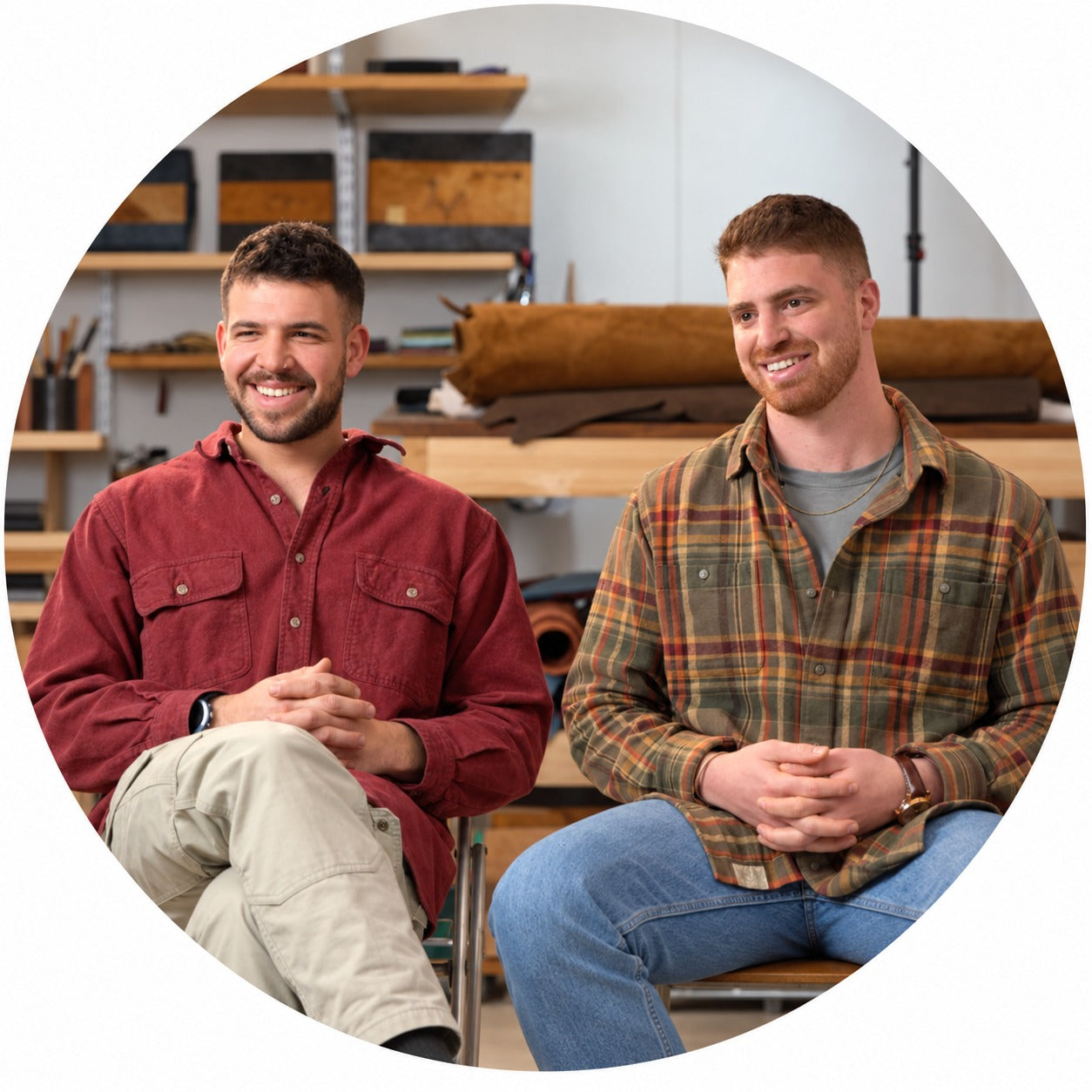 Two entrepreneurs seated together in their workshop